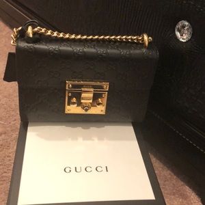 Gucci black and gold small handbag